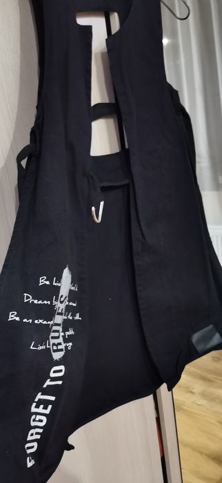 Елек на марката Negative