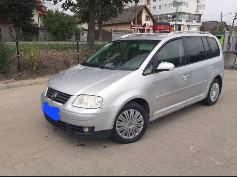 Vând volkswagen tuaran