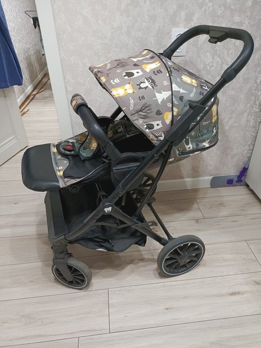 Детская прогулочная коляска