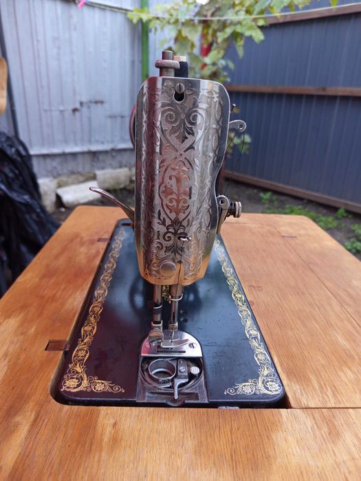 Mașina de cusut Singer