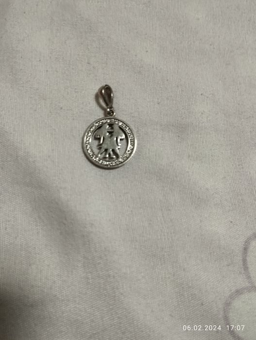 Продаётся кулон близнецы серебро проба 925.Киргили