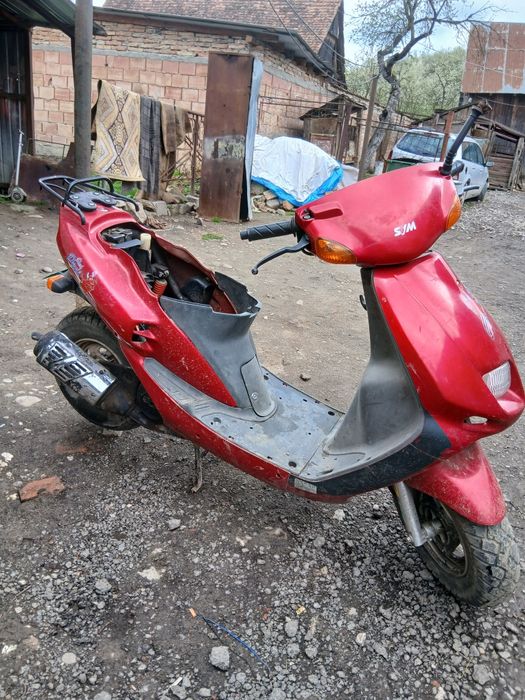Vând scuter sym booster