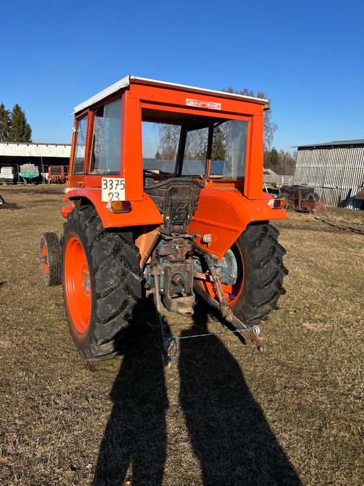Vand tractor universal 445 UTB cu plug disc si cupa in tiranț