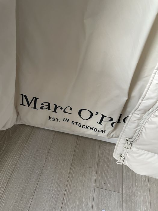 Пуховик женский Marcopolo