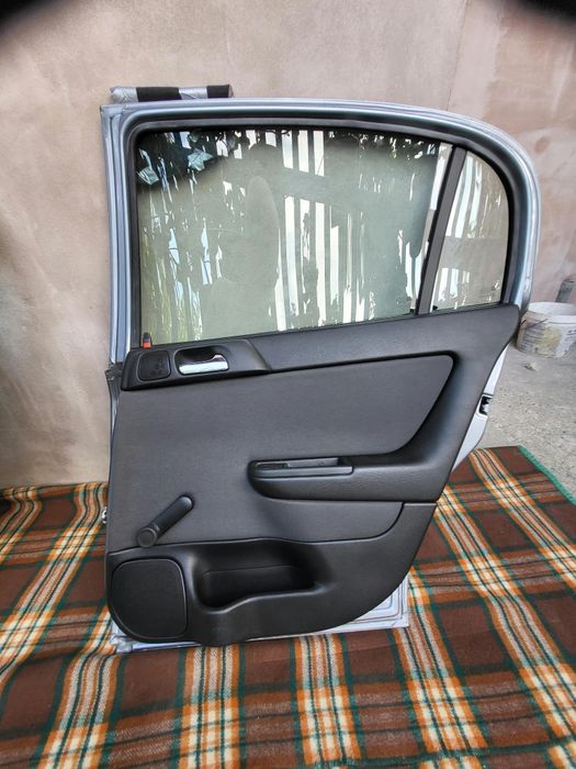 Usi spate opel astra g