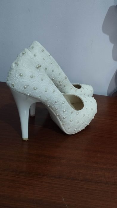 Oq tufli nikoh tõy uchun