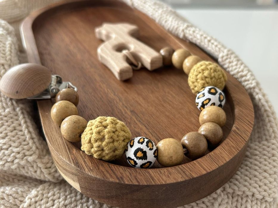 Промоция на ръчно изработен клипс за биберон