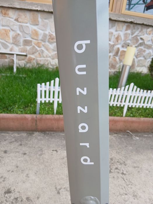 Тротинетка марка buzzard