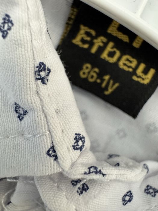 Тъмно син костюм за бебе