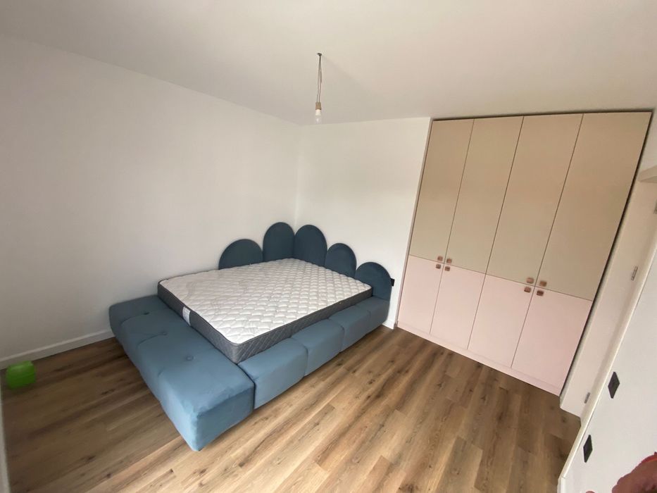 Pat tapitat dormitor