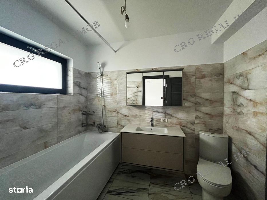 Casa noua cu 5 camere 3 bai curte 419mp comuna Berceni