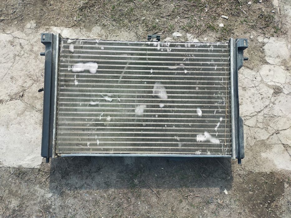 Радиатор с вентилятором на опель омега б