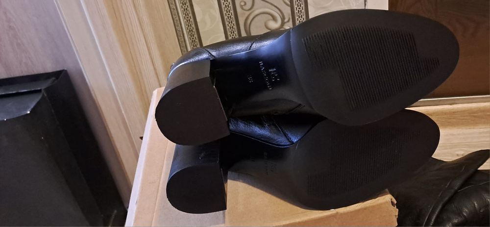 Продам новые кожаные зимние сапоги 38р