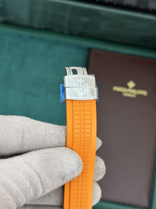 Patek Philippe Aquanaut – Black Dial, Orange Rubber Strap