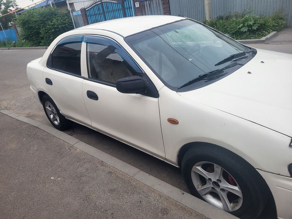 Мазда 323 Фамила