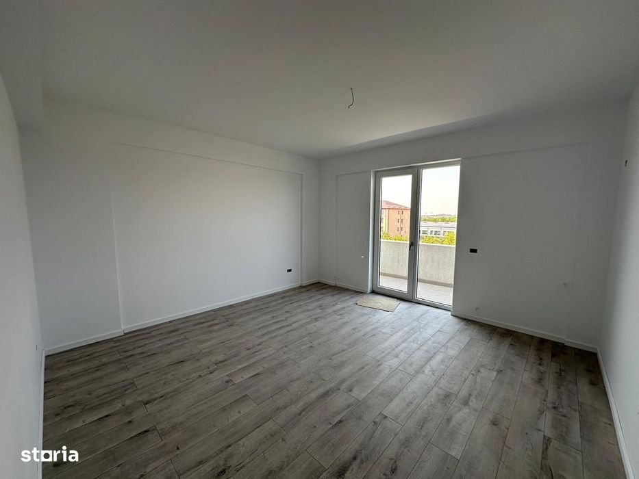Ap 2 camere cu incalzire in pardoseala + curte proprie + loc parcare