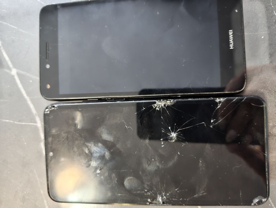 Телефони за части