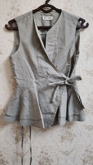 Оливковая жилетка