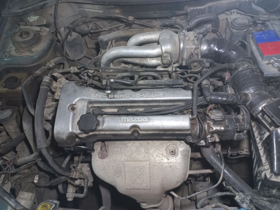 Мазда323F 95г бензин