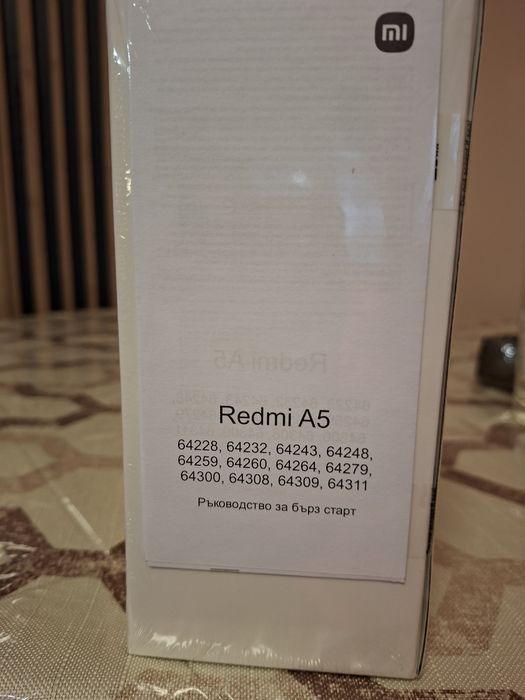Продавам нов  Телефон REDMI A5