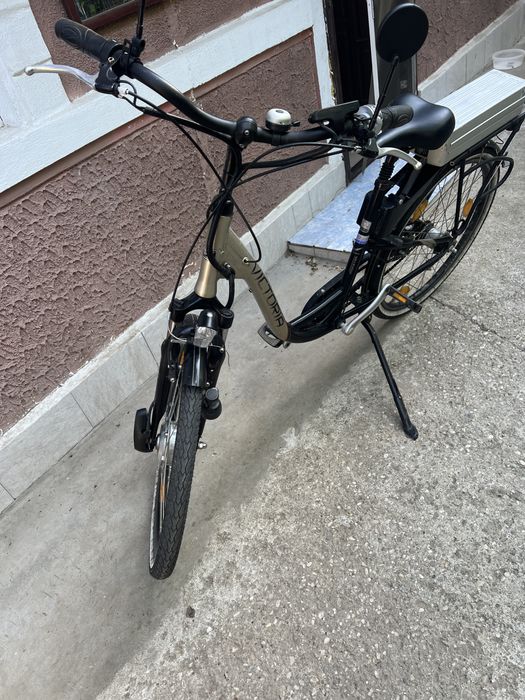 Bicicleta electrica Victoria cu acceleratie la mana