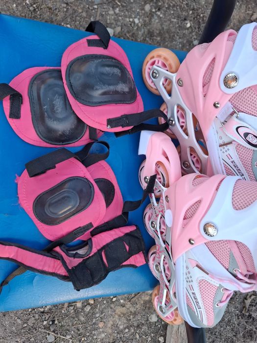 Роликовые коньки