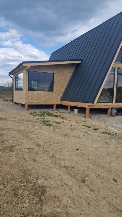 Costrucții case și cabane din lemn