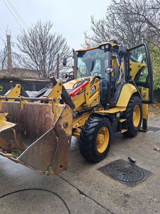 Vand buldoexcavator cat 428