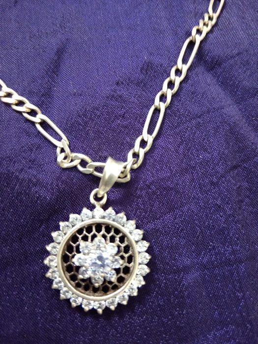 Два серебрянных комплекта