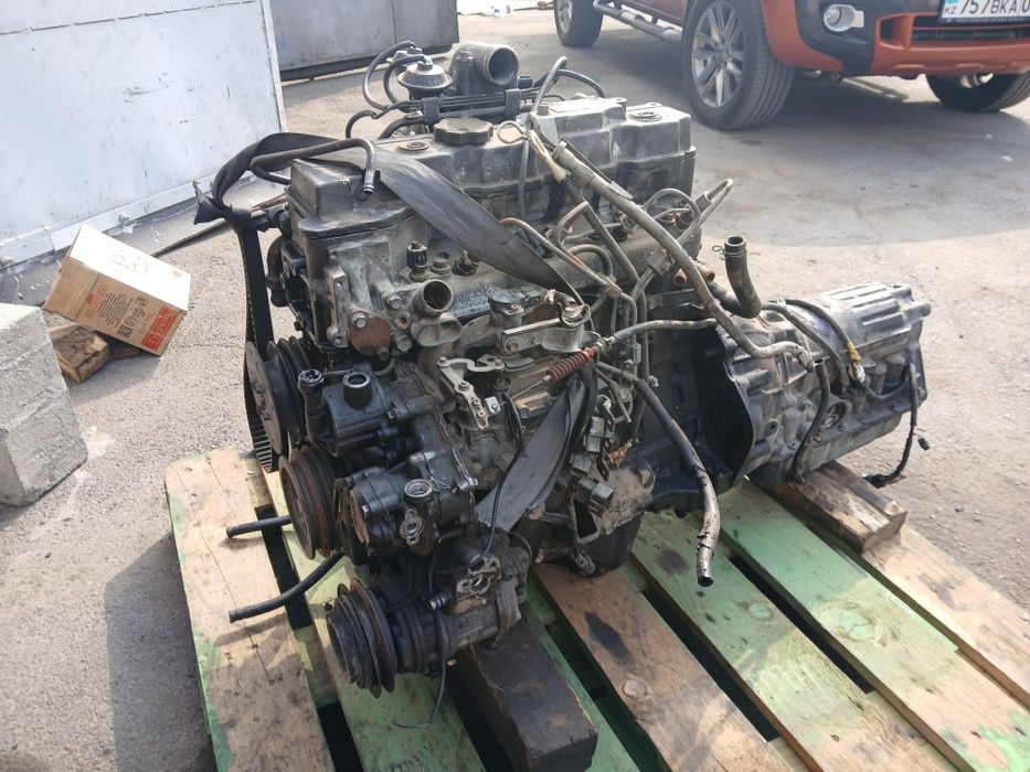 Двигатель 4М40 по запчастям