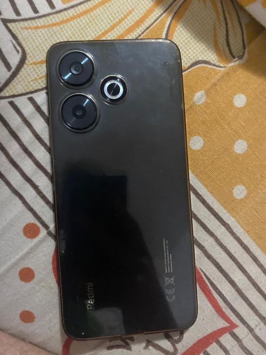 Redmi13 este bun