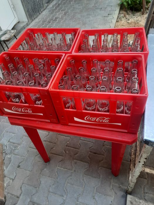 Кока-кола тара бор бутилкаси билан