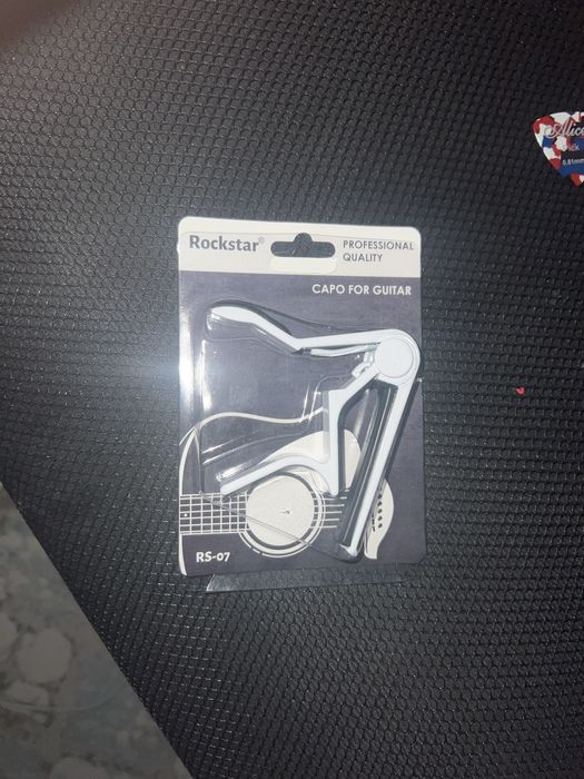 Медиаторы для гитары И каподастор