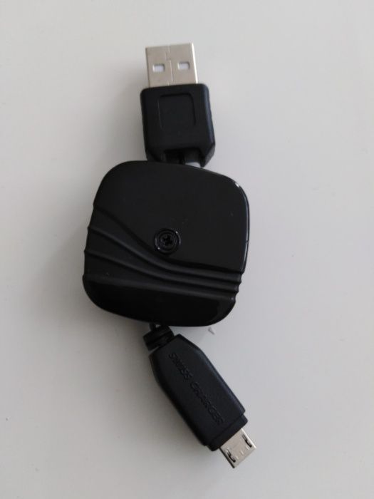Vand incarcator original elvetian,retractabil.mufa mini usb,nou nout.
