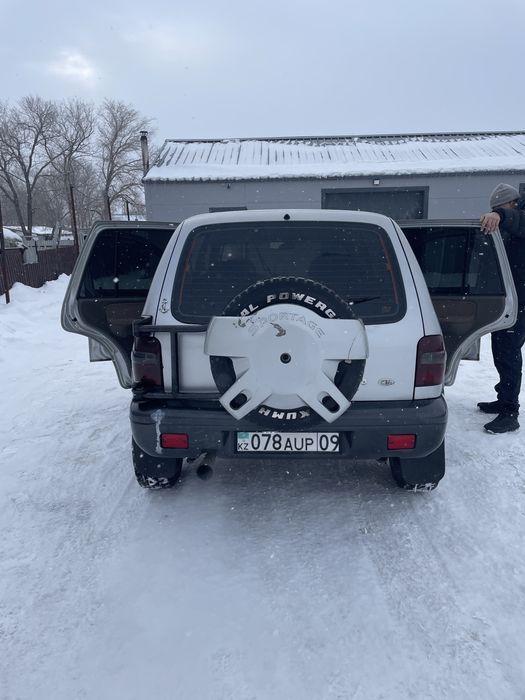 Машина kia sportage идеал