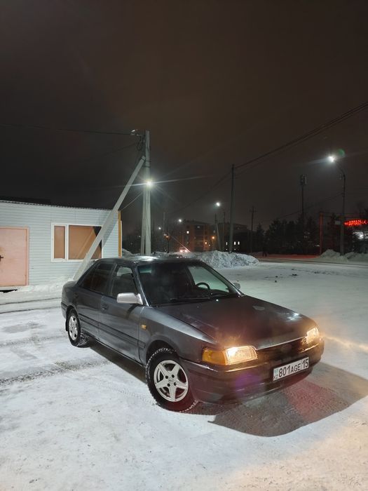 Машина мазда 323