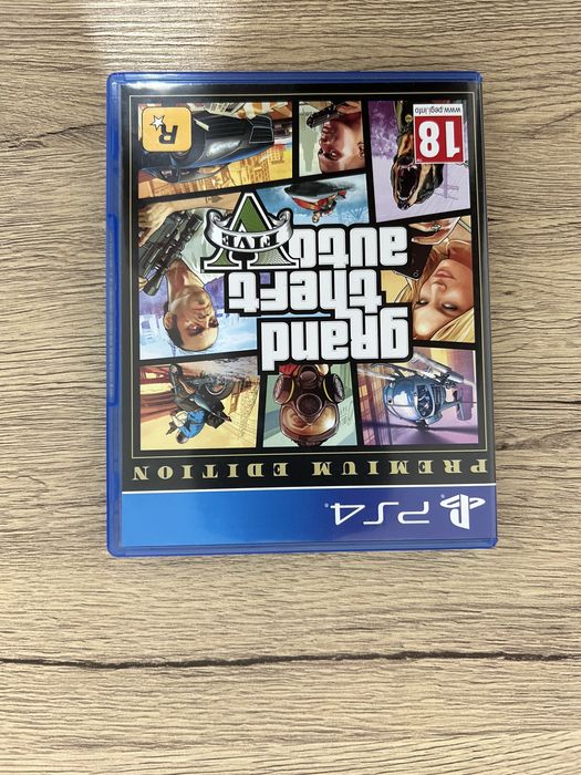 PlayStation 4 Pro 1TB + 2 Controllere + FIFA 23 + GTA V – Stare Excelentă