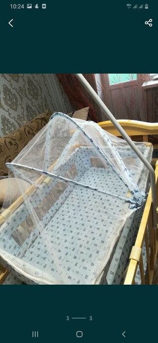 Детская кроватка с люлькой