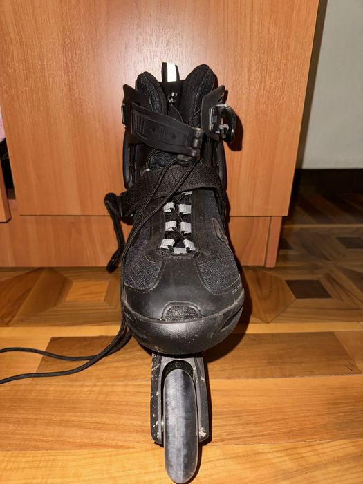 Роликовые коньки