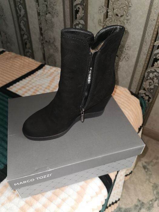 Продам новые сапоги