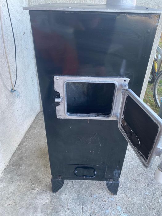 Soba otel, emailata negru, 7.7 kW, max 50 mp, Economica, usa focar fonta, Evotools