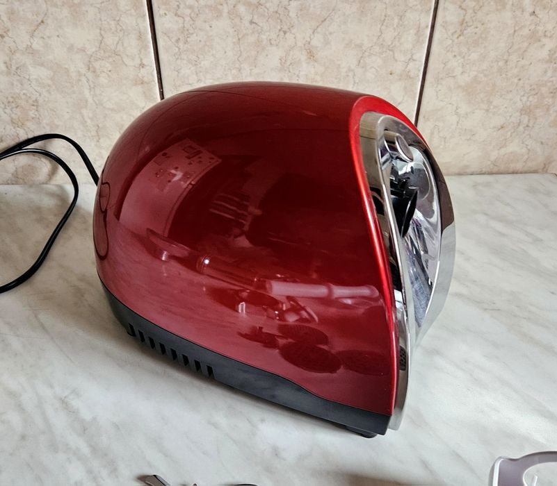 Masina de tocat Heinner