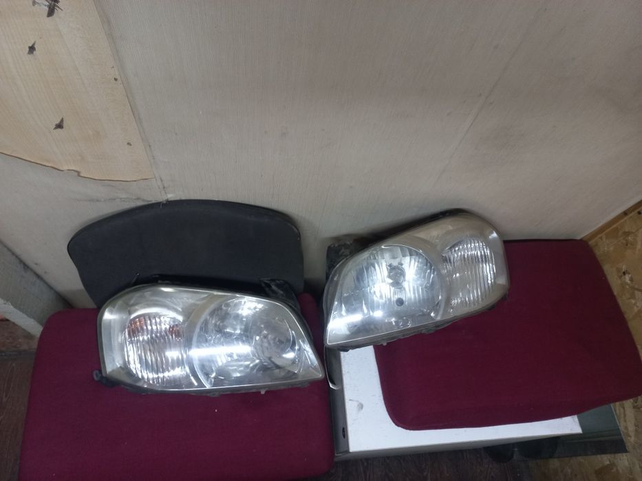 фары мазда трибут