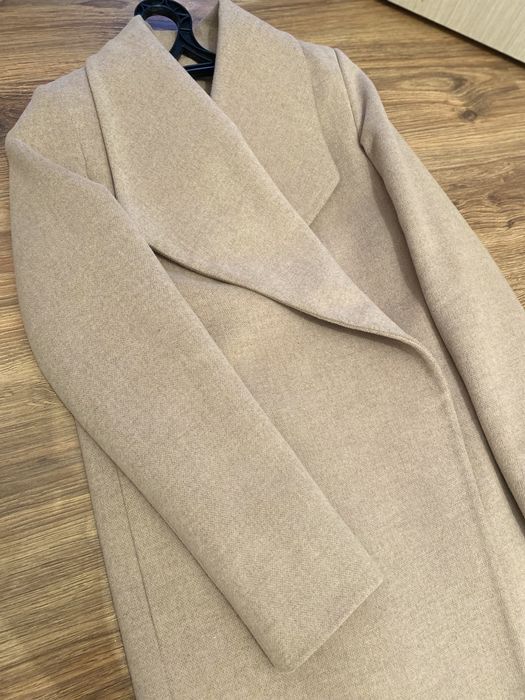 Продам пальто новое