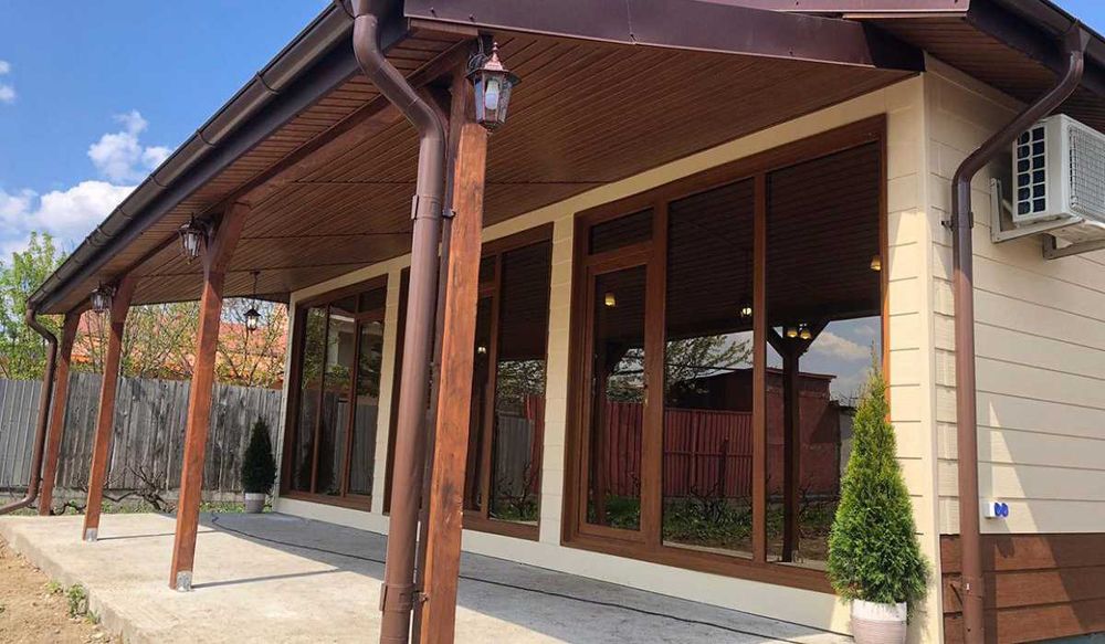 Casa modulara, garaje auto si containere tip birou din structura metalica si panou sandwich termoizolant