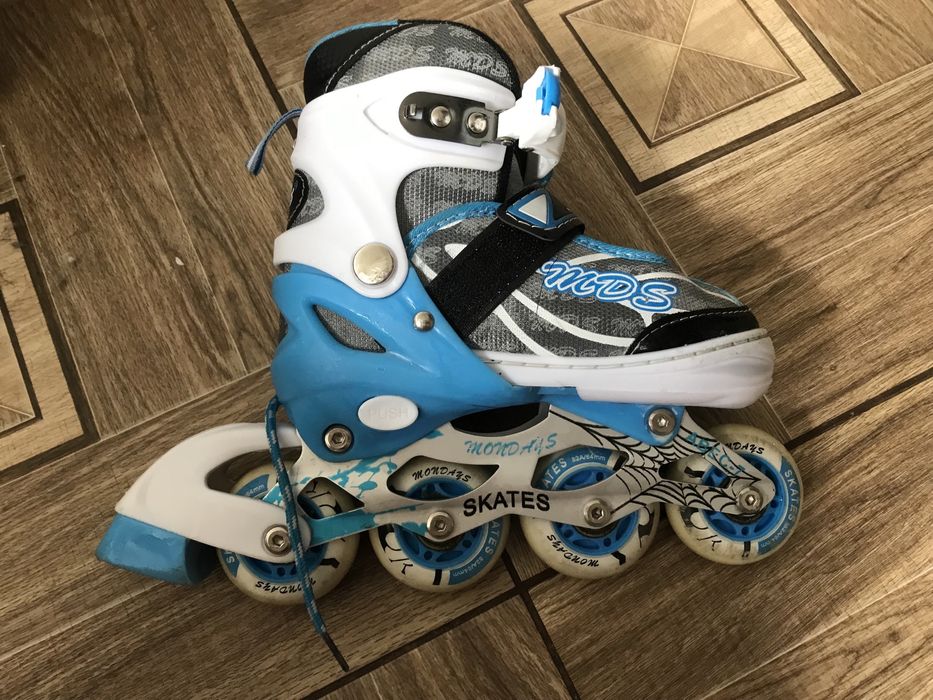 Роликовые коньки