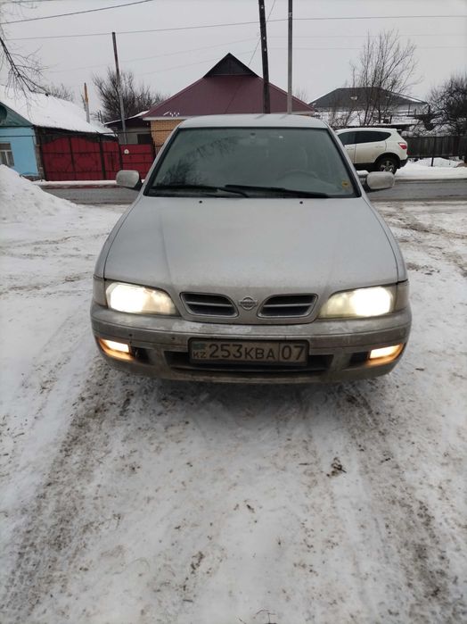 Ниссан примера р11 1999 год