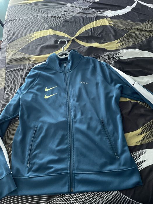 Nike swoosh слуичер