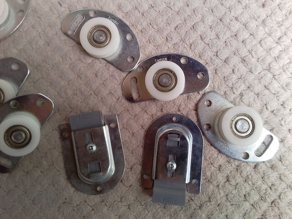 Ролки за плъзгащи врати Laguna Ø34 мм – комплект (долни + горни)