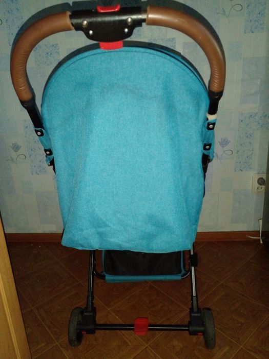 Детская прогулочная коляска всесезонная